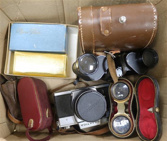 A quantity of cameras and opera glasses